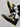 BLACK AND BEIGE SNEAKER WITH FLOWER DETAIL FOR SNEAKER LOVERS