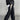 BLACK PUFFER JACKET AND TRACK PANTS OUTFIT WITH CHIC CARGO PARACHUTE DETAILS