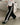 BLACK WIDE-LEG SWEATPANTS WITH WHITE STRIPES AND BOW TIE DETAIL