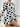 COW PRINT ROMPER: PLUSH COW PRINT LONG ADULT ONESIE