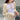 Crocheted beige bolero featured in a hollow sunscreen knit sweater for sun protection