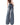 DISTRESSED DENIM PANTS WITH HEART-SHAPED CUTOUTS AND TIE DETAILS