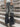 Two-tone baggy jeans featured with a solid color ruffle denim belt for adults