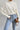 KNIT SWEATER CREAM COLOR STRUCTURED BATWING ICONIC 2000S-INSPIRED SWEATER