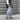 LIGHT BLUE BAGGY FIT JEANS WITH BLACK CROSS DESIGNS