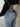 LIGHT BLUE FLARED JEANS WITH TRIBAL DESIGN AND SKINNY FIT BELT