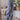 LIGHT BLUE HIGH-WAISTED FLARED TROUSERS WITH RED STAR DETAIL