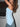 LIGHT BLUE STRAPLESS TOP WITH PLAYFUL SLANTED HEM