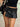 PLEATED MINI SKIRT WITH STUDDED BELT - PLEATED SLIT LEATHER STYLE