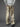 SNAKESKIN-PATTERNED BAGGY PANTS WITH DENIM DRESS INSPIRED DESIGN