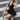 TWO-PIECE SET BLACK HALTER AND BUBBLE SKIRT WITH CUTOUT DETAILS