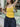 VIBRANT YELLOW CAMI AND BLACK CARGO PANTS SET WITH BOLD LETTER PRINT