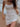 WHITE RIBBED MINI DRESS WITH ADJUSTABLE SHOULDER STRAPS