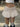 WHITE RUFFLED MINI SKIRT WITH ADJUSTABLE CRISSCROSS TIE, SLIM FIT