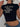 BLACK CROP TOP WITH OFFENSIVE TEXT AND SPARKLING SEQUIN DETAIL