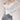 BLACK OFF-THE-SHOULDER TOP WITH BUTTERFLY DETAIL AND SHEER SLEEVES