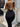 BLACK RIBBED HALTER DRESS WITH STRAPPY DETAILS