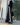 BLACK WIDE-LEG SWEATPANTS WITH WHITE STRIPES AND BOW TIE DETAIL