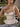 CORSET-STYLE TOP WITH TIE STRAPS AND BOW TIE CAMI DETAIL