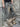 DISTRESSED SKULL BELT DENIM PANTS RAW HEM JEANS