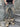 DISTRESSED SKULL BELT DENIM PANTS RAW HEM JEANS