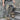 DISTRESSED SKULL BELT DENIM PANTS RAW HEM JEANS