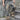 DISTRESSED SKULL BELT DENIM PANTS RAW HEM JEANS