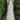 ELEGANT WHITE DRESS WITH BLACK RIBBON ACCENTS AND ROMANTIC PUFF SLEEVES