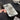 GRAY IPHONE CASE SILVER METAL FISH SPINE