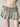 GREEN DENIM PLEATED MINI SKIRT