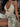 HALTER DRESS WITH THIGH-HIGH SLIT AND DEEP NECKLINE