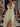 HALTER DRESS WITH THIGH-HIGH SLIT AND DEEP NECKLINE