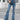 HIGH-WAISTED BELL-BOTTOM JEANS WITH FRAYED HEM FOR A HIP POP LOOK