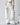 HIGH-WAISTED WHITE JEANS WITH LACE DETAILING AND DISTRESSED RIPS