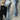 LIGHT BLUE FLARED JEANS WITH TRIBAL DESIGN AND SKINNY FIT BELT