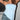 LIGHT BLUE STRAPLESS TOP WITH PLAYFUL SLANTED HEM