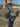 LOW-RISE FLARED JEANS WITH CHAIN DETAIL AND WIDE TROUSER LEGS