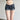 LOW-RISE SLIM-FIT DISTRESSED DENIM SHORTS WITH SLIGHT STRETCH IN SOLID COLOR