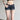 LOW-RISE SLIM-FIT DISTRESSED DENIM SHORTS WITH SLIGHT STRETCH IN SOLID COLOR