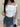 OFF-THE-SHOULDER WHITE TOP WITH FLUTTER SLEEVES AND FLATTERING SILHOUETTE
