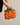 ORANGE ROCKING HORSE HANDBAG AIRPODS CASE
