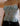 PLEATED LAYERED TIE-FRONT TOP WITH LACE TRIM IN LIGHT BLUE
