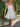 PLEATED MINI DRESS WITH BUTTON-DOWN DESIGN FOR A PLAYFUL TOUCH