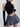 PLEATED MINI SKIRT BLACK TOP OUTFIT HIGH NECK