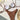TWO-PIECE BROWN SWIMSUIT WITH WHITE FLOWER ACCENTS AND SIZE GUIDE