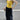 VIBRANT YELLOW CAMI AND BLACK CARGO PANTS SET WITH BOLD LETTER PRINT