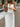 WHITE HALTER VEST AND MAXI SKIRT SET WITH CUTE SPLIT SKIRT DESIGN