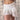 WHITE LACE RUFFLED MINI SKIRT