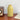 YELLOW FLOWER VASE WITH WHITE DAISIES IN AESTHETIC PASTEL STYLE