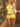 YELLOW HALTER TOP AND SHORTS SET FABRIC TEXTURE